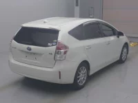 Toyota PRIUS ALPHA лот № 312 оценка RA  с аукциона в Японии 1