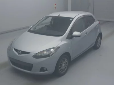 Mazda DEMIO  с аукциона в Японии