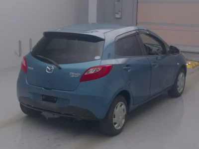 Mazda DEMIO  с аукциона в Японии