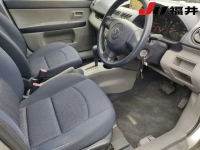 Mazda DEMIO  с аукциона в Японии