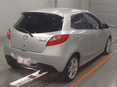 Mazda DEMIO  с аукциона в Японии
