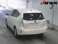 Toyota PRIUS ALPHA лот № 3058 оценка 3.5  с аукциона в Японии 1