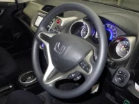 Honda FIT лот № 3076 оценка 4  с аукциона в Японии 2