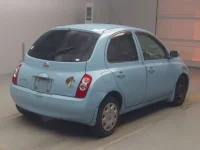 Nissan MARCH лот № 74104 оценка RA  с аукциона в Японии 1