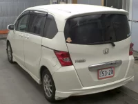 Honda FREED лот № 2101 оценка 3.5  с аукциона в Японии 1