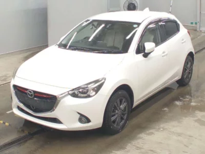 Mazda DEMIO  с аукциона в Японии
