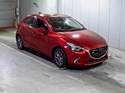 Mazda DEMIO  с аукциона в Японии