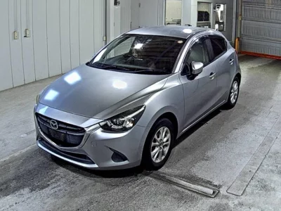 Mazda DEMIO  с аукциона в Японии