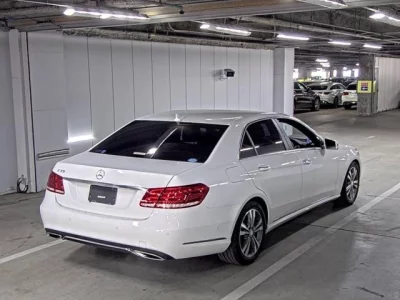 Mercedes-Benz E CLASS  с аукциона в Японии