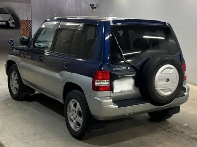 Mitsubishi PAJERO IO  с аукциона в Японии
