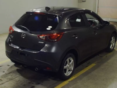Mazda DEMIO  с аукциона в Японии