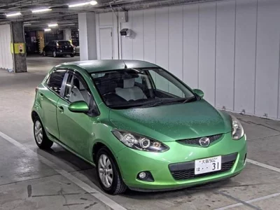 Mazda DEMIO  с аукциона в Японии