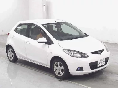 Mazda DEMIO  с аукциона в Японии