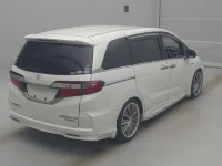 Honda ODYSSEY лот № 70194 оценка RA  с аукциона в Японии 1