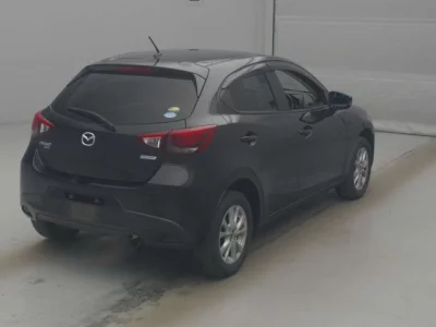 Mazda DEMIO  с аукциона в Японии