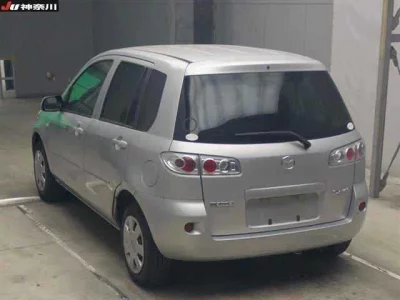 Mazda DEMIO  с аукциона в Японии