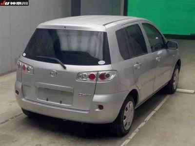 Mazda DEMIO  с аукциона в Японии