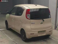 Nissan MOCO лот № 3023 оценка 4  с аукциона в Японии 1