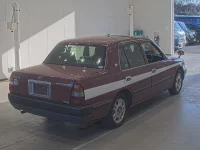 Toyota CROWN COMFORT лот № 1883 оценка RA  с аукциона в Японии 1