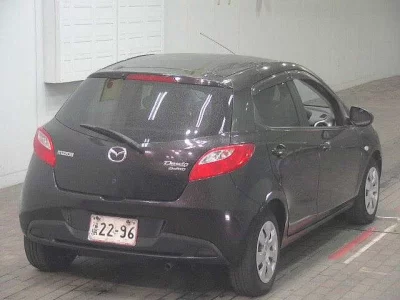 Mazda DEMIO  с аукциона в Японии