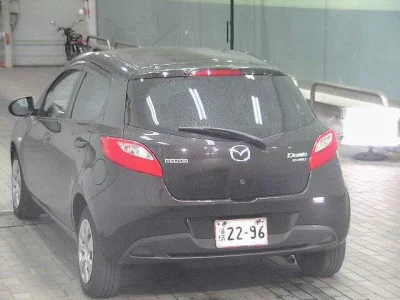 Mazda DEMIO  с аукциона в Японии