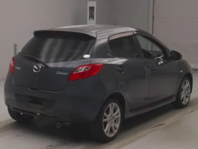 Mazda DEMIO  с аукциона в Японии