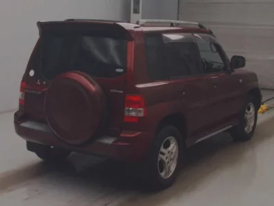 Mitsubishi PAJERO IO  с аукциона в Японии
