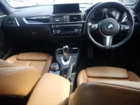 BMW 1-Series лот № 9040 оценка 3.5  с аукциона в Японии 2
