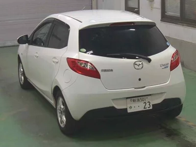 Mazda DEMIO  с аукциона в Японии