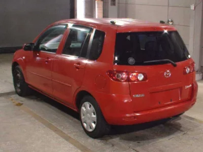Mazda DEMIO  с аукциона в Японии