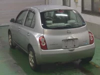 Nissan MARCH лот № 64 оценка R  с аукциона в Японии 1