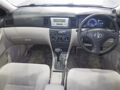 Toyota COROLLA RUNX  с аукциона в Японии