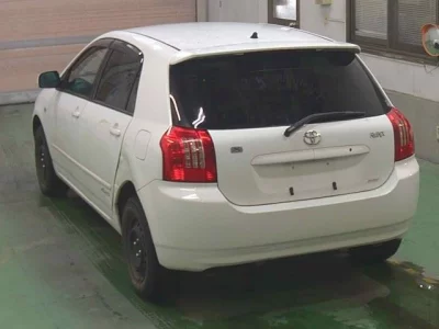 Toyota COROLLA RUNX  с аукциона в Японии