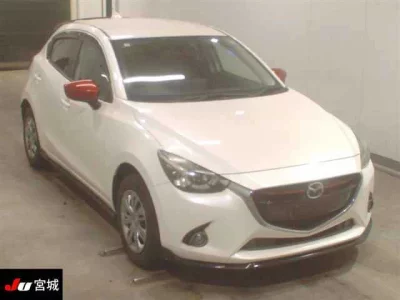 Mazda DEMIO  с аукциона в Японии