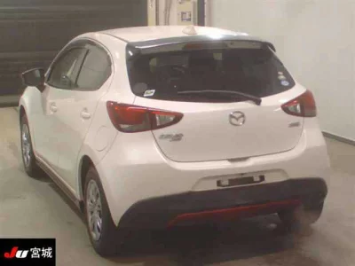 Mazda DEMIO  с аукциона в Японии