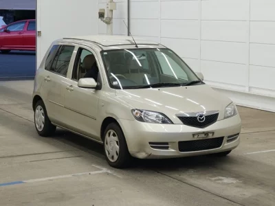 Mazda DEMIO  с аукциона в Японии