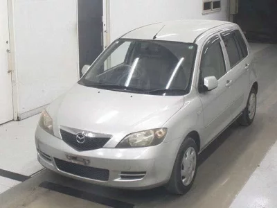 Mazda DEMIO  с аукциона в Японии