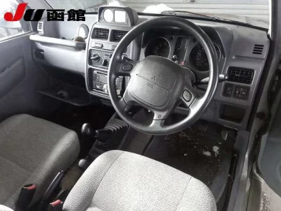 Mitsubishi PAJERO JR  с аукциона в Японии