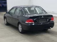 Mitsubishi LANCER лот № 2877 оценка RA  с аукциона в Японии 1