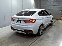 BMW X6 лот № 7140 оценка 4  с аукциона в Японии 4