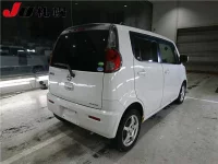 Nissan MOCO лот № 3033 оценка -  с аукциона в Японии 1