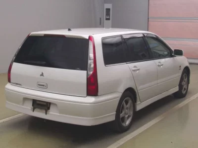 Mitsubishi LANCER  с аукциона в Японии
