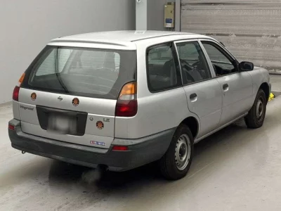Nissan WINGROAD  с аукциона в Японии