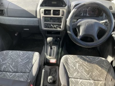 Mitsubishi PAJERO IO  с аукциона в Японии