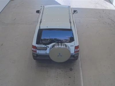 Mitsubishi PAJERO IO  с аукциона в Японии