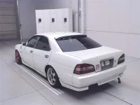 Nissan LAUREL лот № 70024 оценка 3  с аукциона в Японии 1