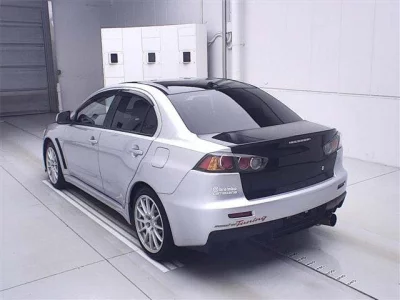 Mitsubishi LANCER  с аукциона в Японии