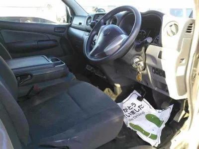 Isuzu COMO  с аукциона в Японии