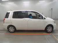 Toyota RAUM лот № 10414 оценка 3.5  с аукциона в Японии 2