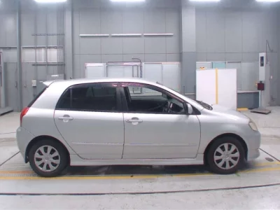 Toyota COROLLA RUNX  с аукциона в Японии